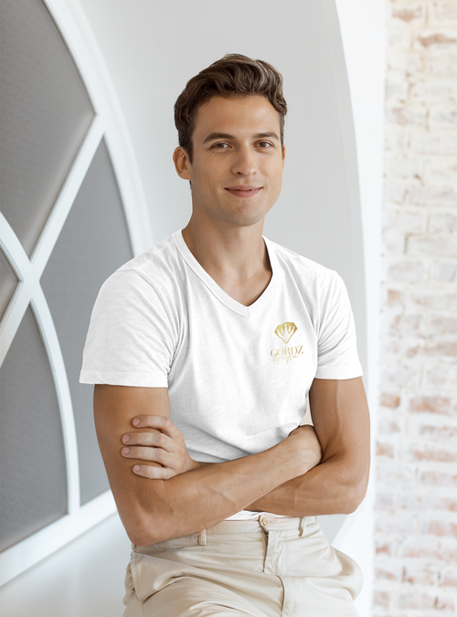 Male model wearing black Gordz Grayson White V-Neck Tee – classic slim fit with subtle chest logo and minimalist neckline representing balance and confidence.
