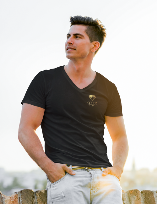 Male model wearing black Gordz Grayson Black V-Neck Tee – classic slim fit with subtle chest logo and minimalist neckline representing balance and confidence.