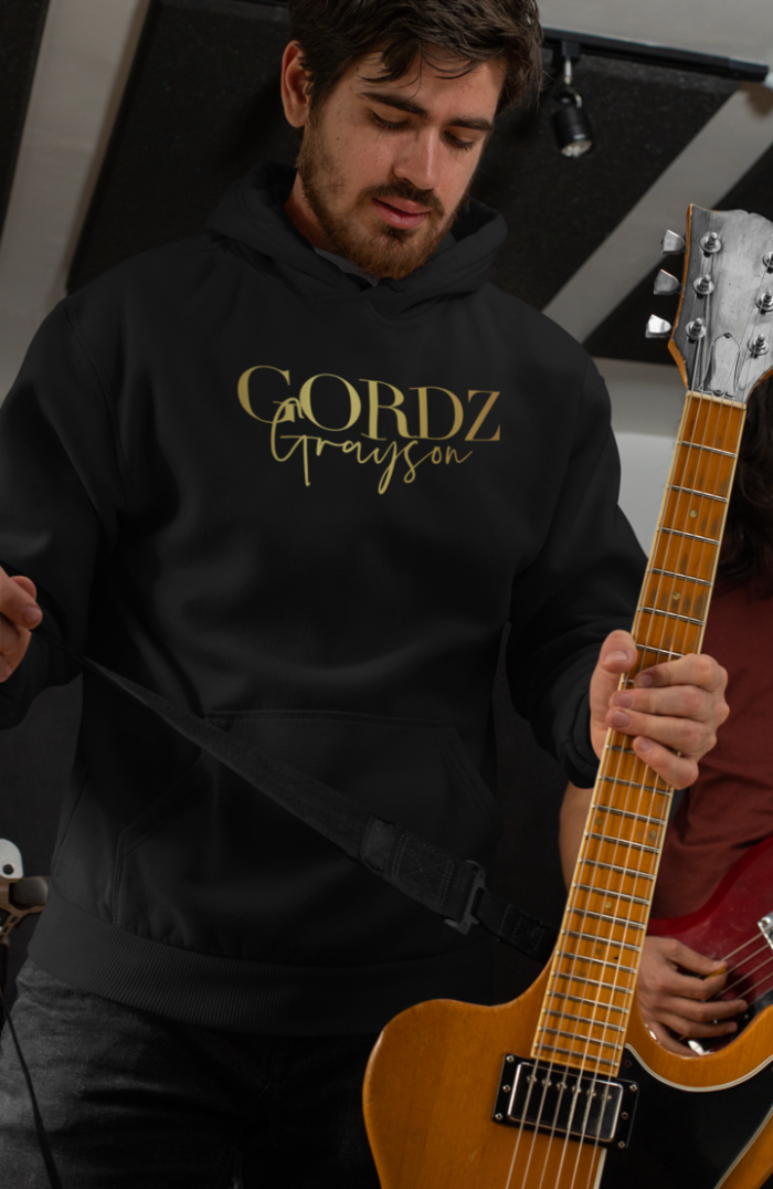 mockup of a guitarist wearing a pullover hoodie 33337 50