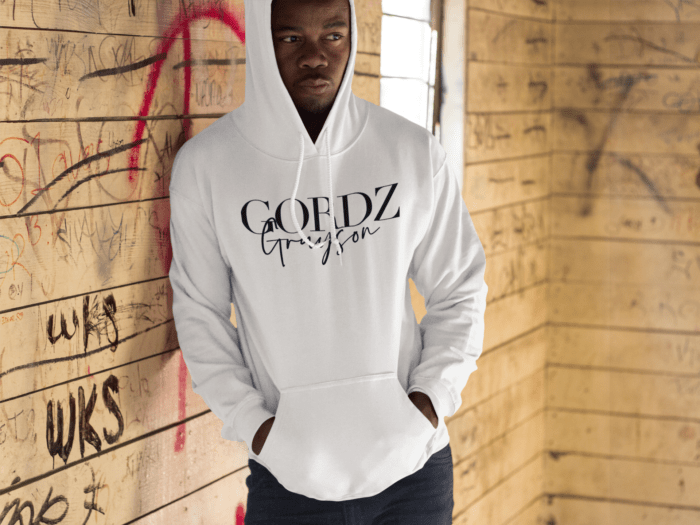 black man at a warehouse hoodie mockup a8759 1