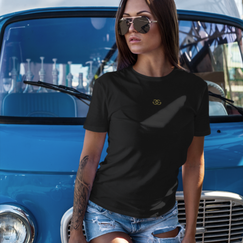 t shirt mockup featuring a woman leaning on a vintage van 2259 el1